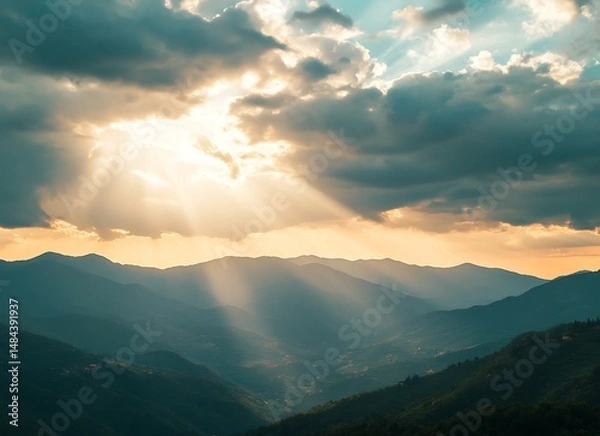 Obraz A beautiful sunset over the lush green hills of Tuscany, with rays shining through the clouds and casting warm hues on the valley below