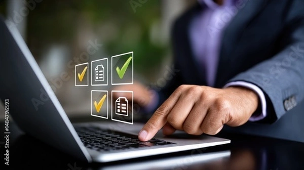 Fototapeta A businessman checks off tasks on a digital interface using a laptop.