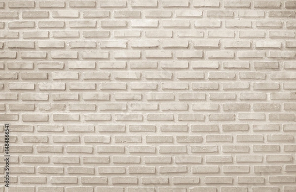 Fototapeta Detail of modern cream brick wall background photo. Brown light brick wall texture background for stone tile block in wallpaper modern interior and exterior backdrop design.
