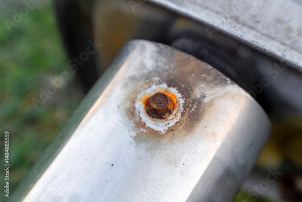 Fototapeta Corroded iron bolt macro on weathered steel