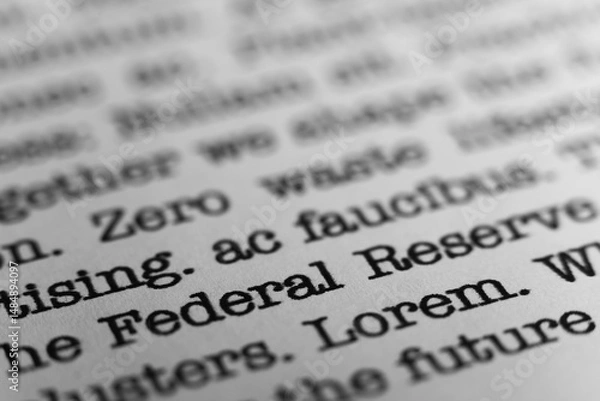 Fototapeta Federal Reserve. Text printed on a page. A piece of paper with a phrase written in retro typewriter font