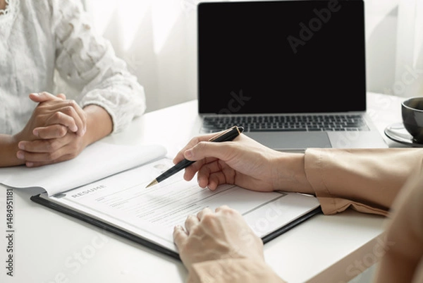 Obraz Business people hold a resume and talk to job applicants for job interviews about careers and Their personal history in the company. Recruitment concepts