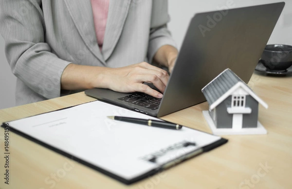 Obraz cagents working in real estate investment and home insurance signing contracts in accordance with the home buying insurance agreements approving purchases for clients