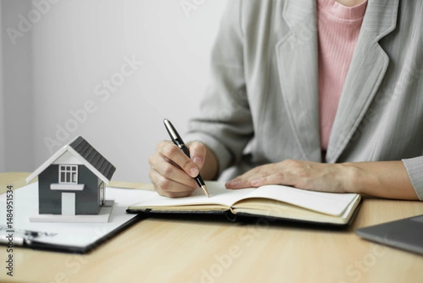 Obraz cagents working in real estate investment and home insurance signing contracts in accordance with the home buying insurance agreements approving purchases for clients