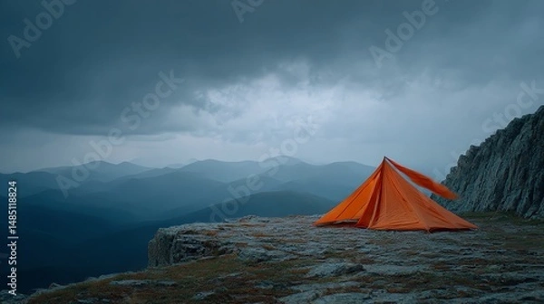 Obraz A waterproof tent braves fierce winds on a mountain ledge, fabric flapping against a stormy sky. Perfect for extreme camping and outdoor adventures in harsh weather.