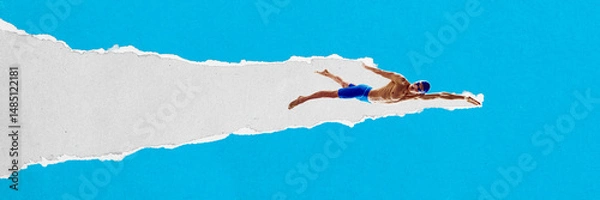 Fototapeta Male swimmer swimming through horizontal torn paper stripe against blue background. Textured scrap collage. Concept of sport, game, competition, strength. Abstract sport artwork with textured elements