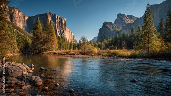 Obraz Stunning Yosemite Valley with El Capitan, a crystal-clear river, and pine trees bathed in golden hour glow. 8K ultra HD nature landscape for breathtaking visuals.