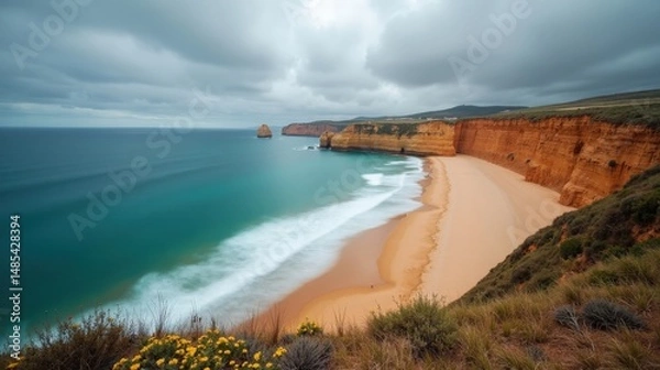 Fototapeta Aerial view of Benijo Beach, Spain, at midday with cloudy skies, capturing the dramatic coastal scenery.