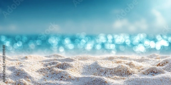Obraz Minimalistic beach background featuring white sand in sharp focus with a blurred turquoise ocean and sky in the distance. The soft bokeh effect creates a dreamy, calm atmosphere ideal for summer theme
