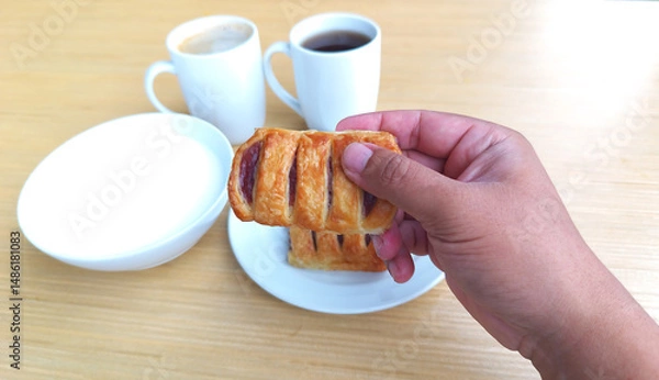Obraz Holding delicious jam strawberry toast pie. tasty, menu, hot, closeup, high calories, arts, cake, mug, drink, objects, background, handle, beverage, cafe, coffee cup, closeup, freshness, healthy .