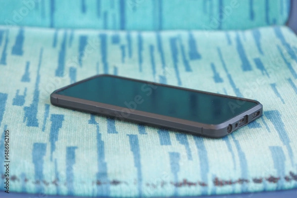 Obraz Smartphone lest of bus seat. lost smart phone concept 
