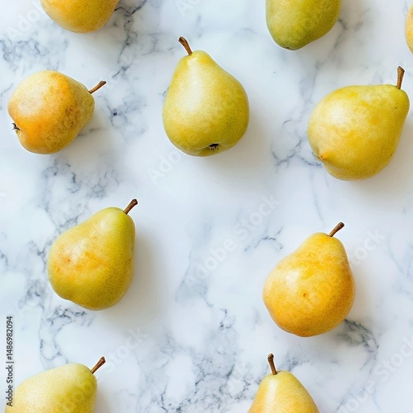 Obraz Fresh green pears arranged on a marble surface.