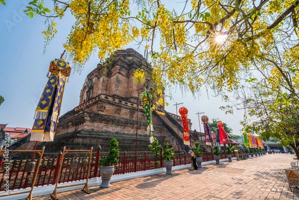 Obraz Lanna lantern and Prayer flags tung Hang or Northern traditional flag hang on sand pagoda in the Wat Chedi Luang temple for Songkran Festival is celebrated in a traditional New Year Day in Chiang Mai
