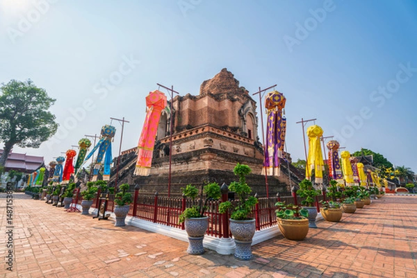 Obraz Lanna lantern and Prayer flags tung Hang or Northern traditional flag hang on sand pagoda in the Wat Chedi Luang temple for Songkran Festival is celebrated in a traditional New Year Day in Chiang Mai