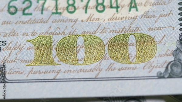 Fototapeta A CloseUp Macro Shot of a One Hundred Dollar Bill with Detailed Focus and Clarity