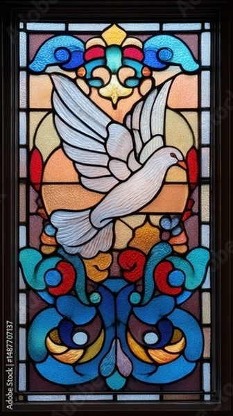Fototapeta Ornate stained glass window depicting a soaring dove.