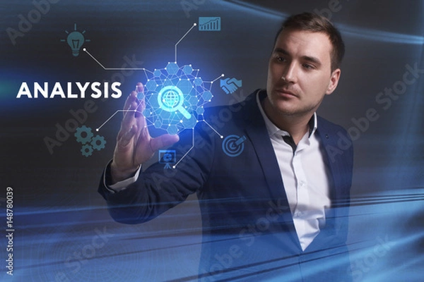Fototapeta Business, Technology, Internet and network concept. Young businessman working on a virtual screen of the future and sees the inscription: Analysis