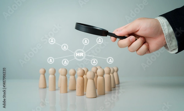 Obraz Human Resources Search for Talent Using Magnifying Glass Concept