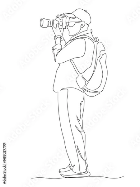 Fototapeta Man photographer in glasses with backpack taking picture with photo camera. Side view. Continuous line drawing. Black and white vector illustration in line art style.