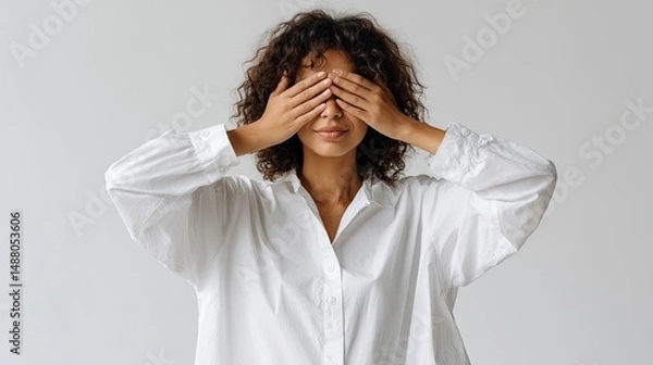 Obraz Person covering eyes with hands studio portrait