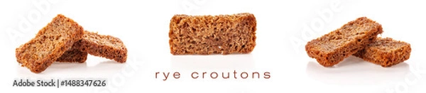Fototapeta Isolated rye salty croutons on white