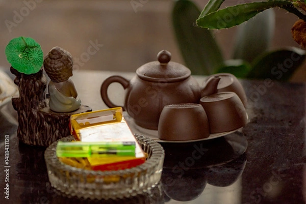 Obraz Still life close-up, tea sets, cigarettes, ashtrays, and flowers indoors