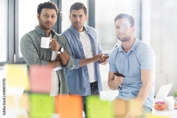 Fototapeta casual businessmen working on new project at modern office, business teamwork