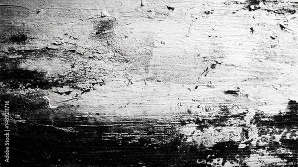 Fototapeta A dirty old grunge wall texture shows a rough, aged concrete surface with a cracked gray pattern