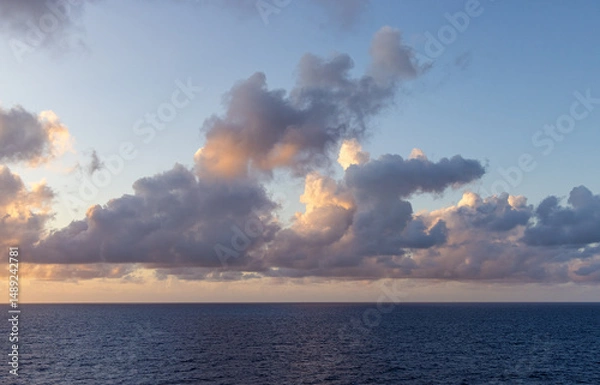 Obraz Dramatic Cloudscape Over the Serene Pacific Ocean at Sunset
