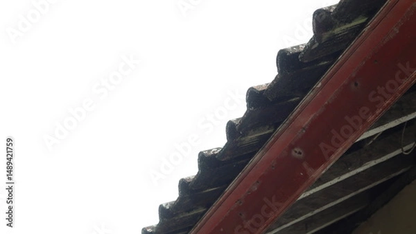 Fototapeta Close-up View of Aged Tile Roof and Exposed Wooden Structure