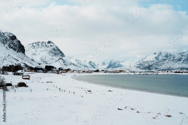 Fototapeta Snowy Ramberg Beach and Mountains in Lofoten