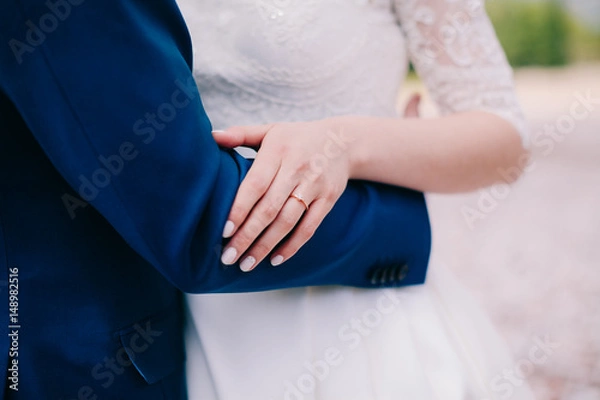 Fototapeta bridal hand with wedding ring