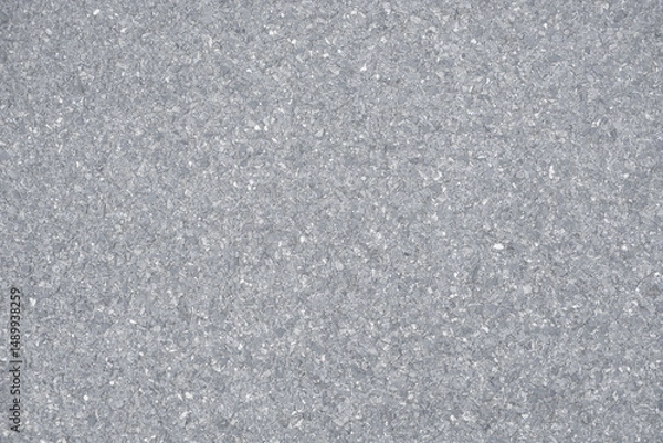 Fototapeta Concrete road surface photographed from above for a light gray background.