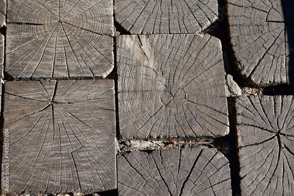 Fototapeta A road surface made of wooden beams using ancient technology.