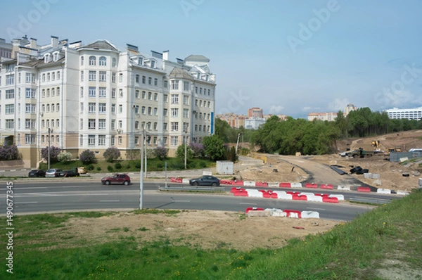 Obraz Construction of a new road using heavy machinery