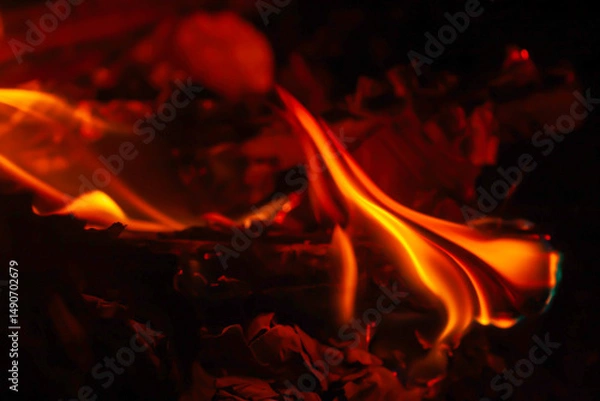 Fototapeta soft focus photo of beautiful fire flames with reflection on dark background.