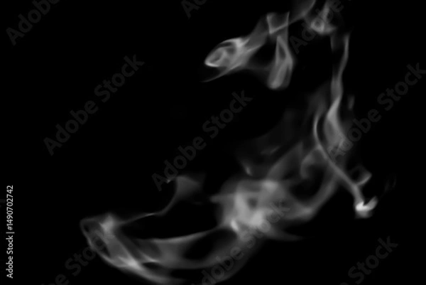 Fototapeta blurred candle smoke over dark background for your abstract design.