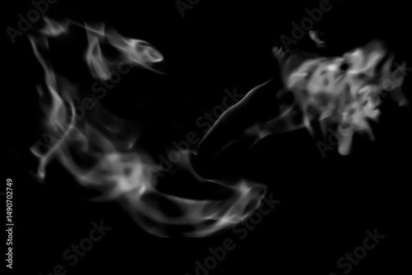 Fototapeta blurred candle smoke over dark background for your abstract design.