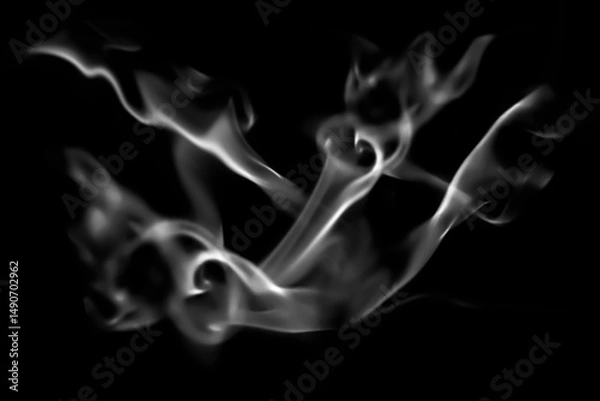 Fototapeta blurred candle smoke over dark background for your abstract design.