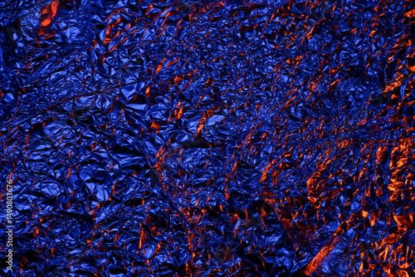 Obraz Red and blue Shiny aluminum foil texture close up