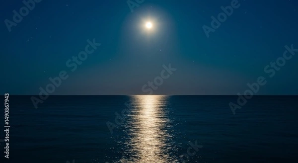 Obraz Serene Moonlit Ocean - A tranquil scene of a full moon reflecting on a calm ocean at night. Dark blue water and sky create a peaceful atmosphere