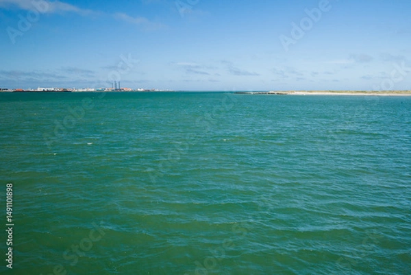 Fototapeta industrial facility near the sea