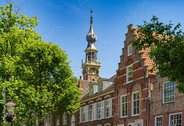 Obraz Stepped gable houses and the bell tower of the town hall (Stadthuis) of Veere, province Zeeland, The Netherlands