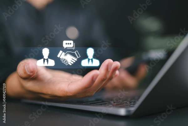 Fototapeta Negotiation concept. Businessman holding with handshake icon for negotiation, agreement, cooperation, business partnership.