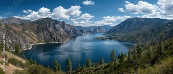 Fototapeta Scenic Panorama of Lake Chelan Washington State USA from High Angle View with Mountains and Clouds on a Sunny Day in the Pacific Northwest