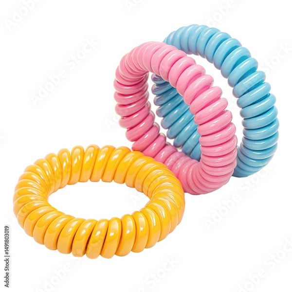 Fototapeta Close up showcases three colorful spiral hair bands, pink, yellow, blue, on transparent background