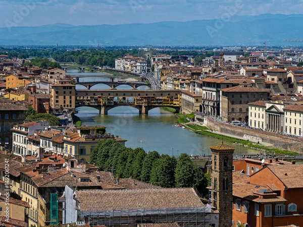 Obraz From a bird’s-eye view, Ponte Vecchio stretches gracefully across the Arno River, its centuries-old arches and vibrant storefronts embodying the timeless charm of Florence.