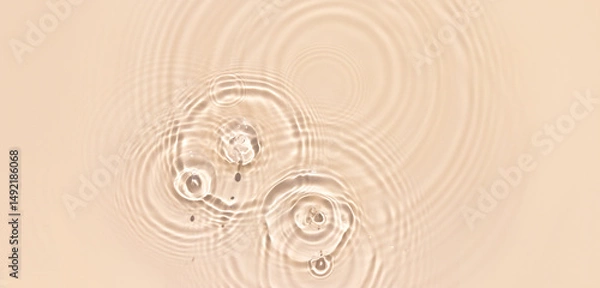 Fototapeta water texture ripples wave clean transparent water abstract background in beige color