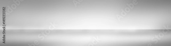 Fototapeta long soft gray studio room background, wide grey floor backdrop with spotlight.