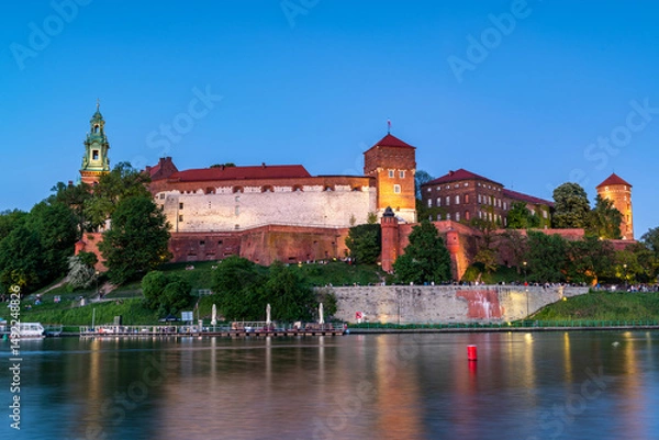 Fototapeta Evening View of Wawel Castle Reflected in Vistula Waters in Cracow , Poland